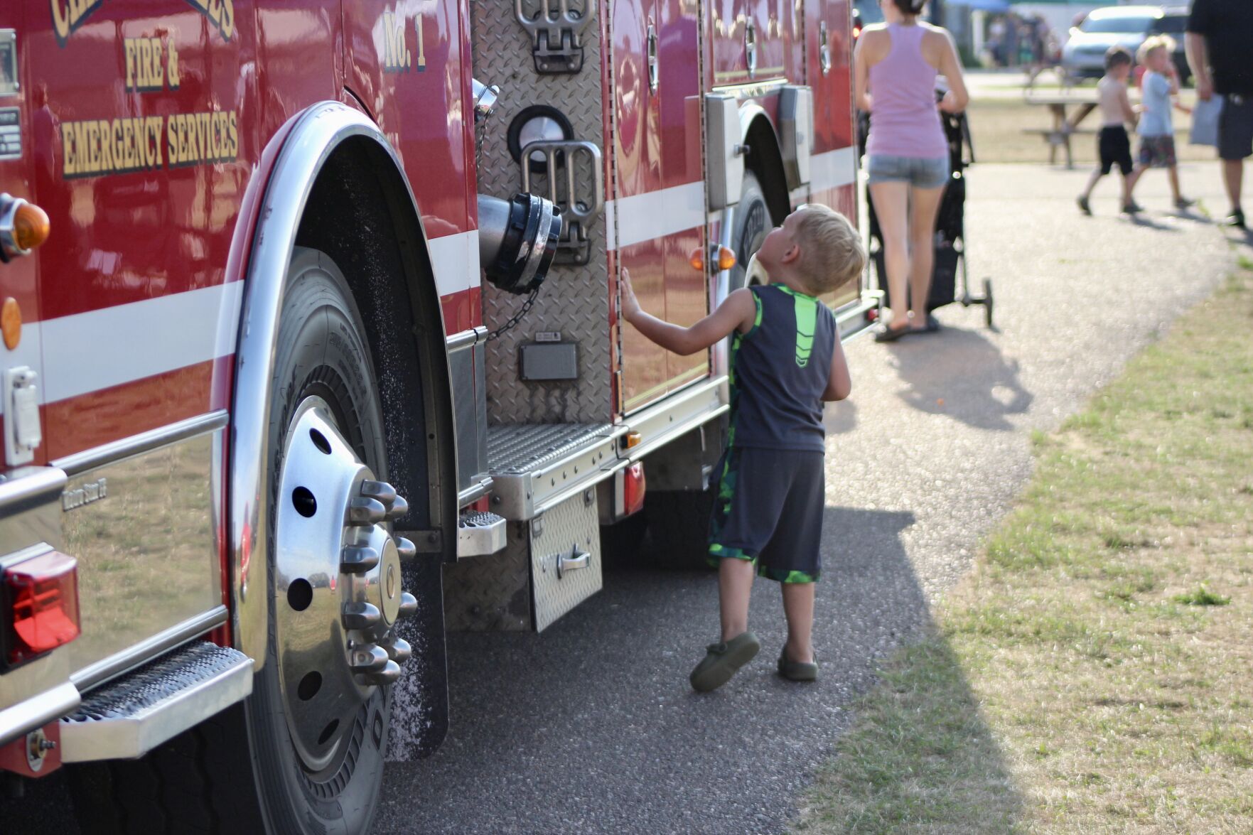 Child and firetruck